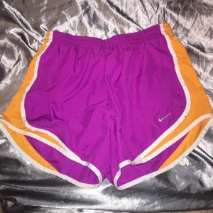 Purple and orange Nike shorts